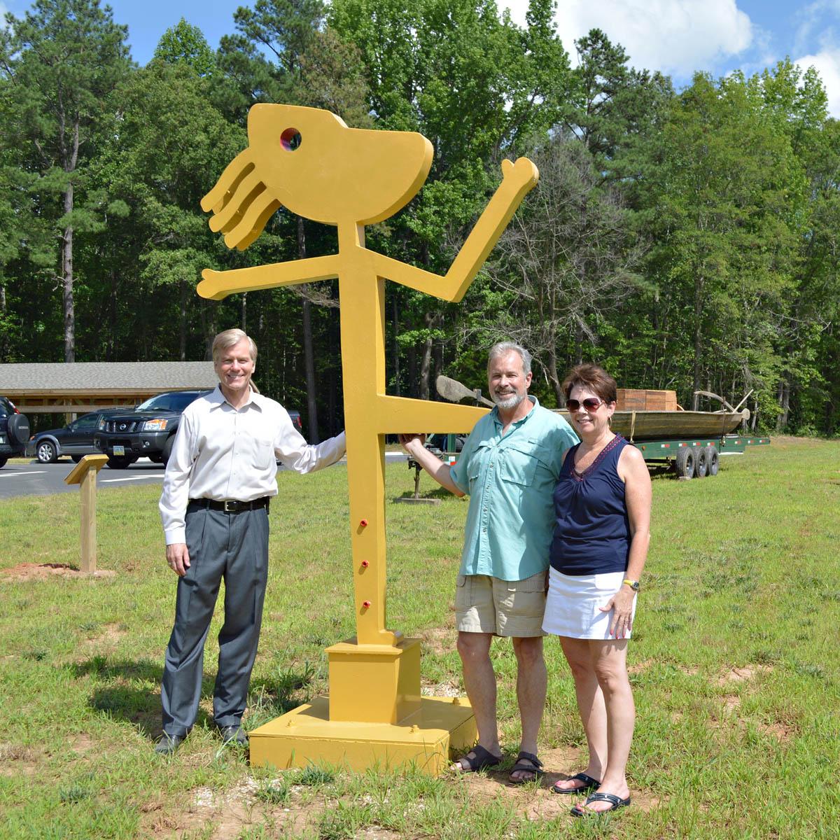 Governor Bob McDonnell, along with “Chief Powhatan”, welcomes new visitors to the opening of the Powhatan State Park. Designed and created by artist Marc Staples, “Chief Powhatan” commands a large presence in the park.
