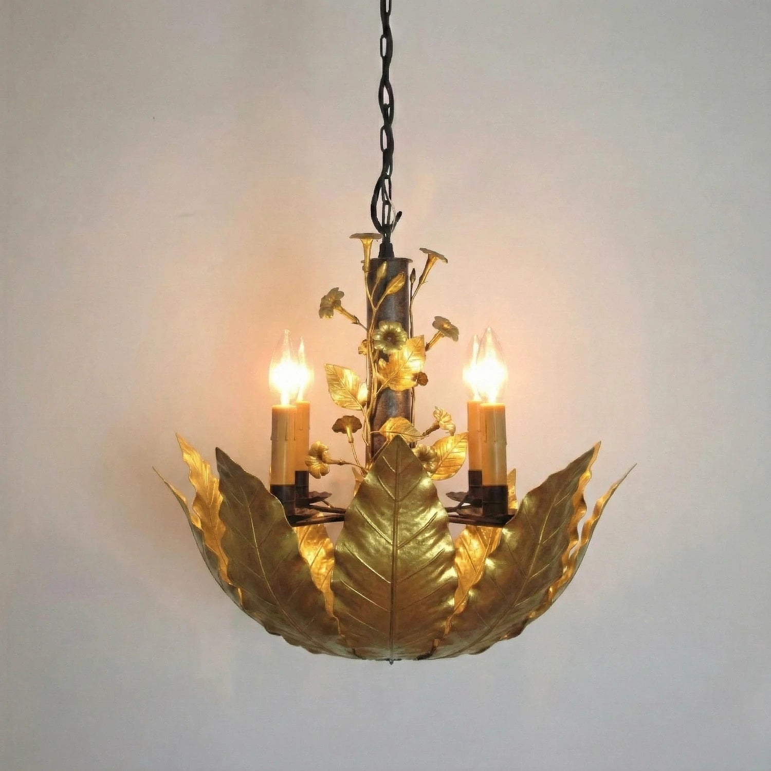 The Aged Burley chandelier in gold finish.