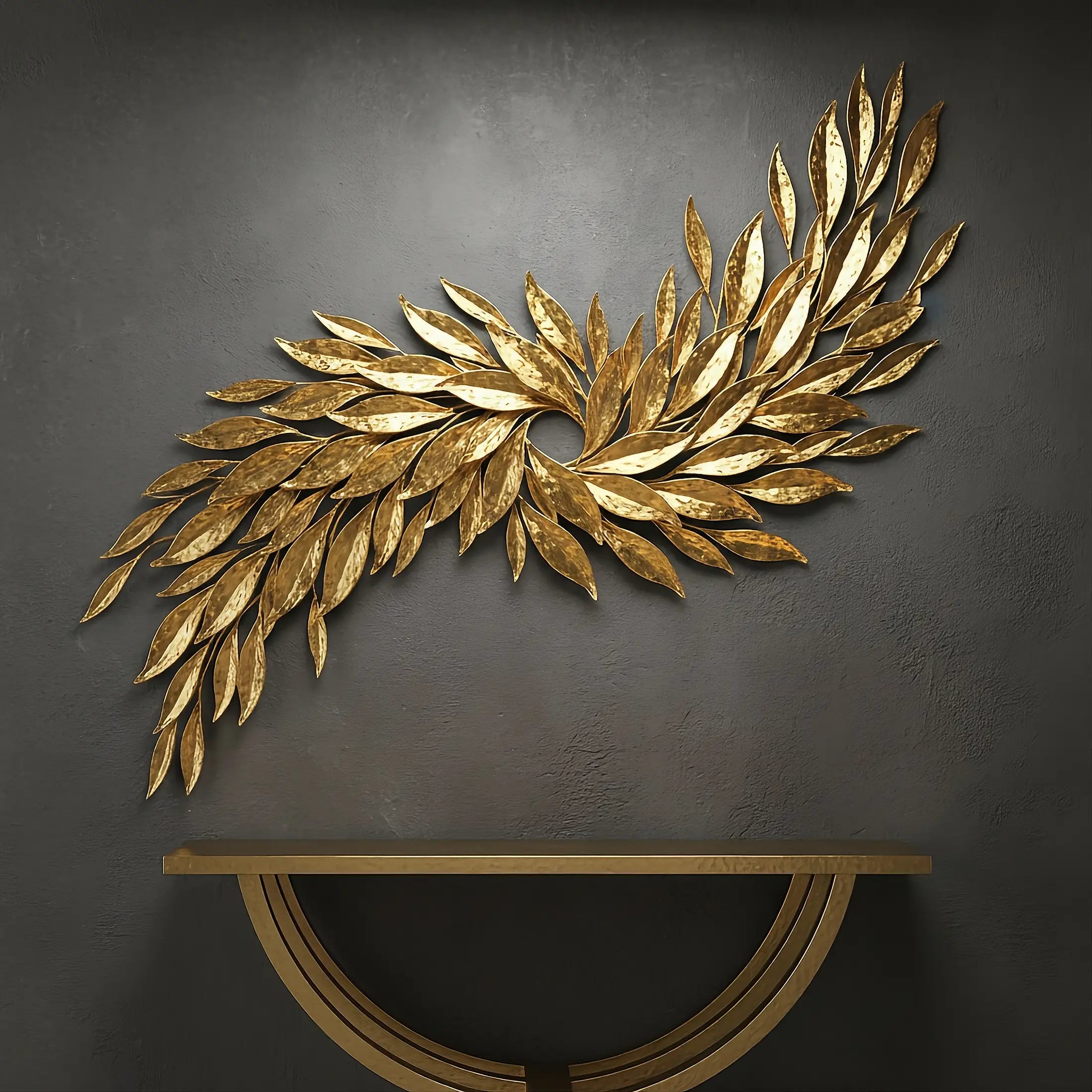 Gold tobacco leaf wall art on a dark gray wall with a wooden console table below.