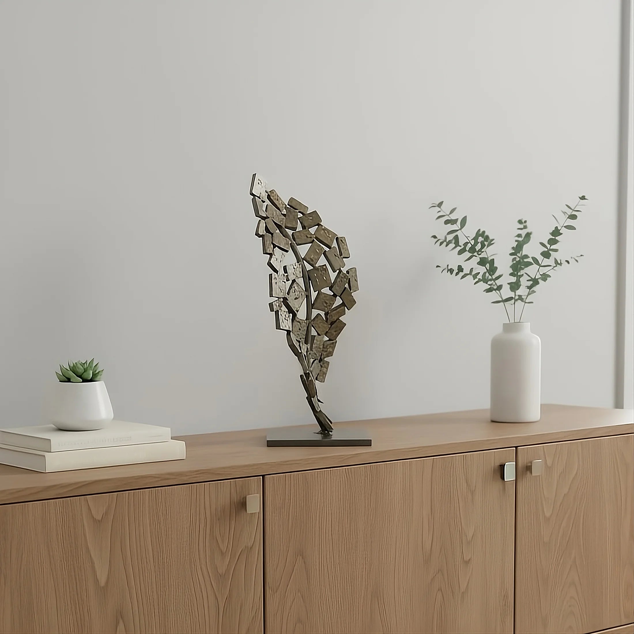 Prometheus sculpture made of stainless steel with bronze accents.