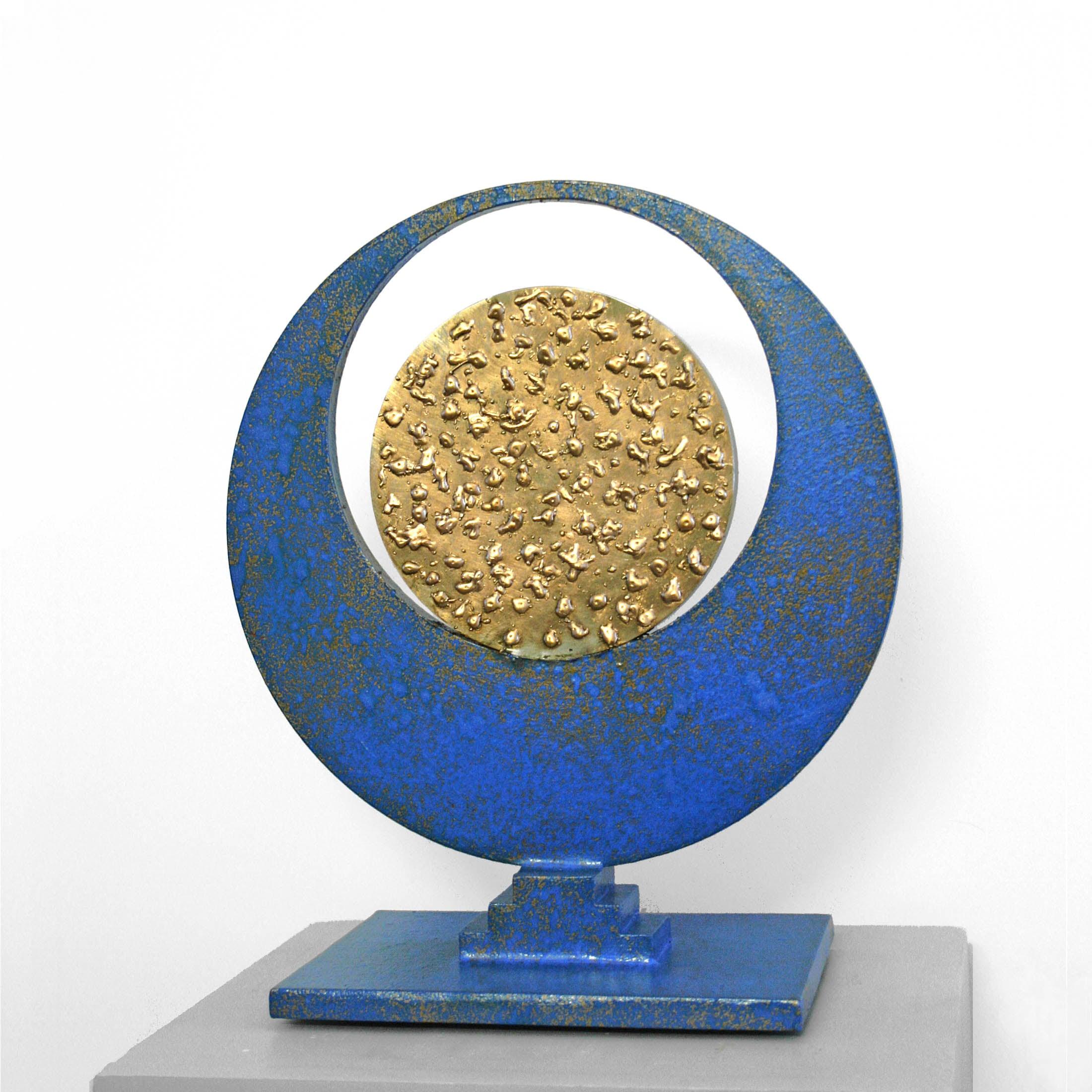 Table top mixed-media sculpture titled Converge