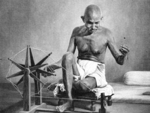 Mahatma Gandhi spinning thread for cloth