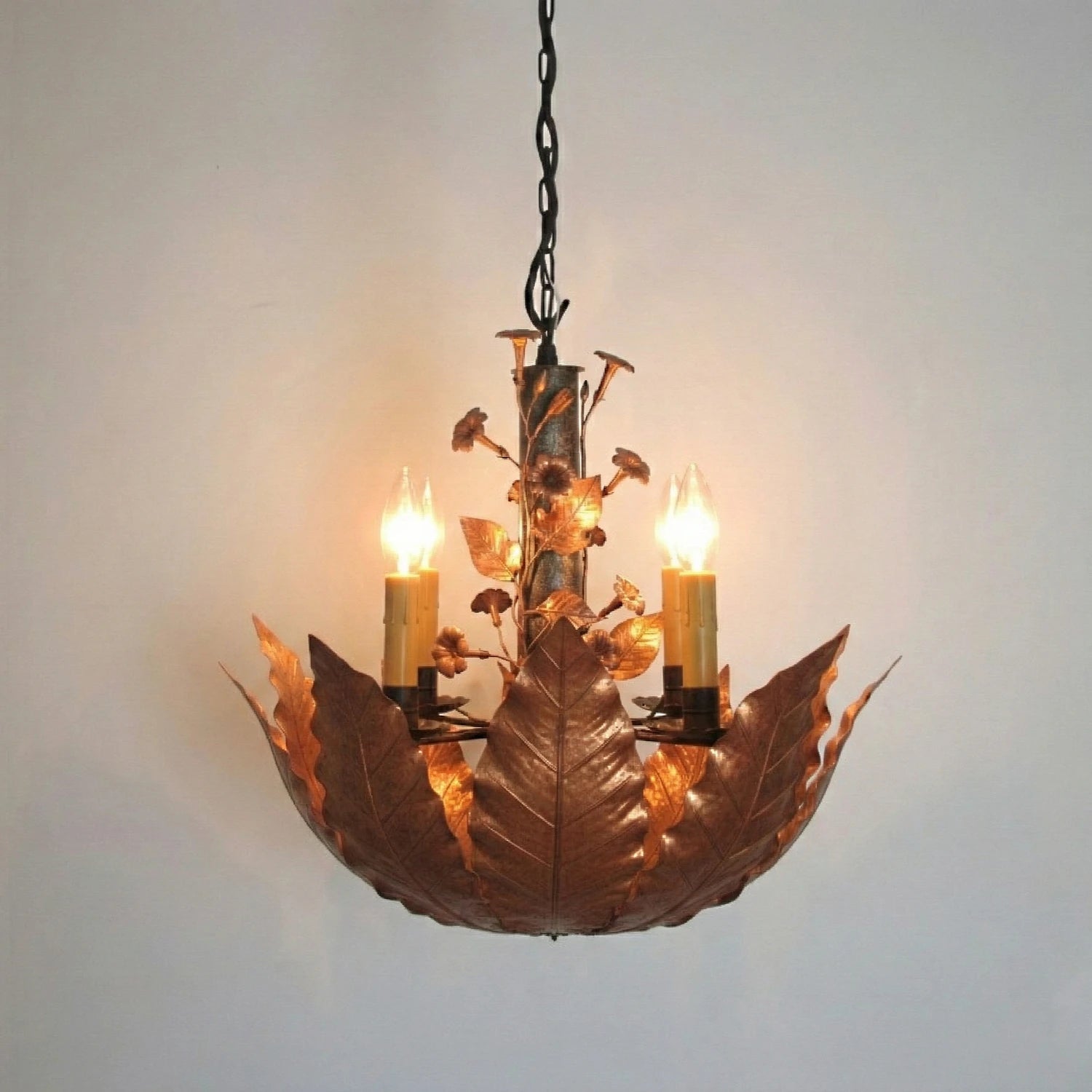 Aged Burley chandelier in torched-copper finish.