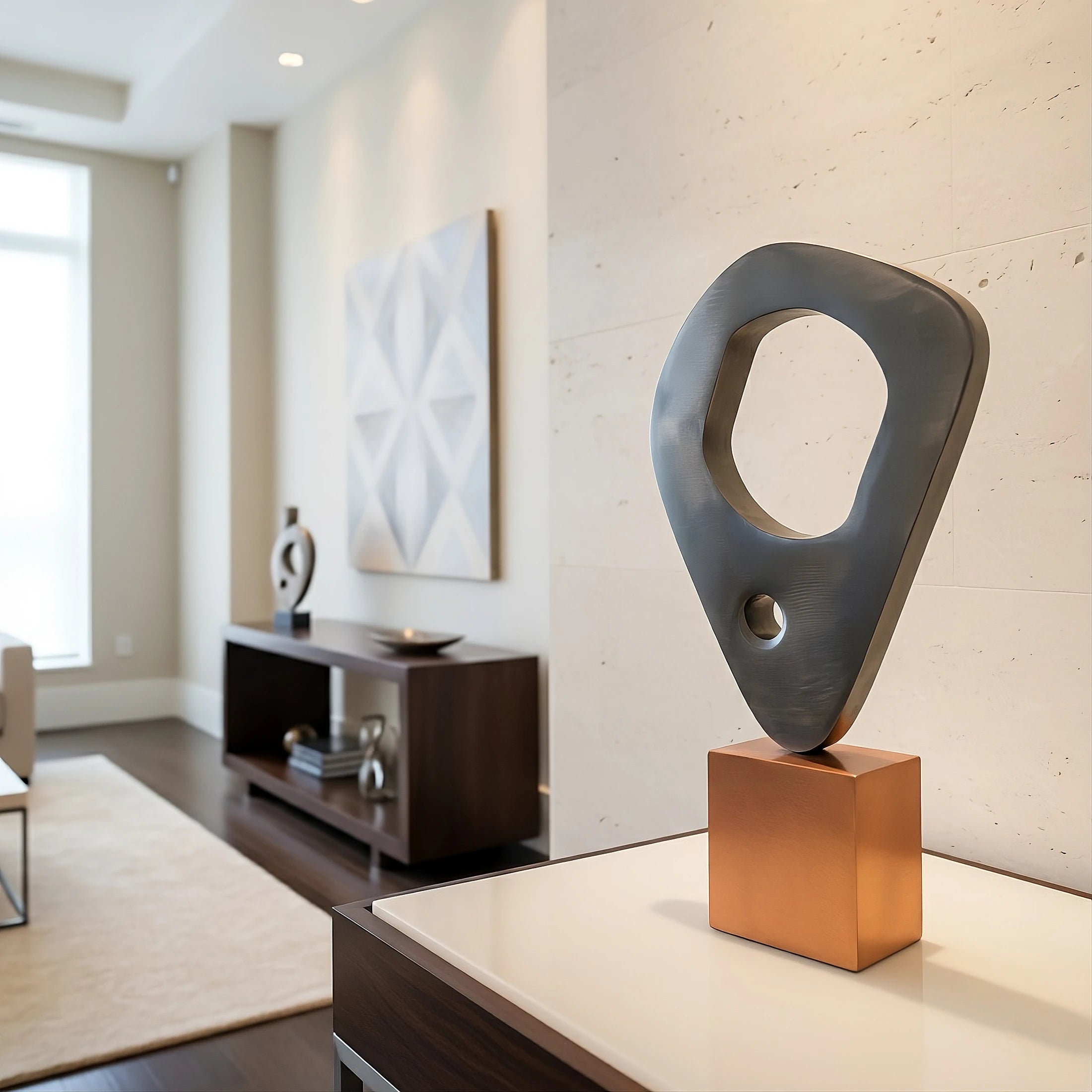 Parallax is a 12-inch tall contemporary metal sculpture composed of a polished stainless steel element resting atop a polished copper cube base.