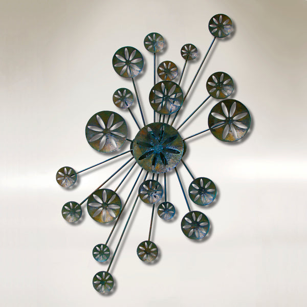 Large metal wall sculpture representing sand dollars