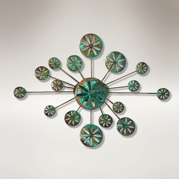 Copper wall sculpture with vibrant green patina. 