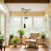 Sunroom featuring the Birdsong Windchime from Lago Luna Originals. 