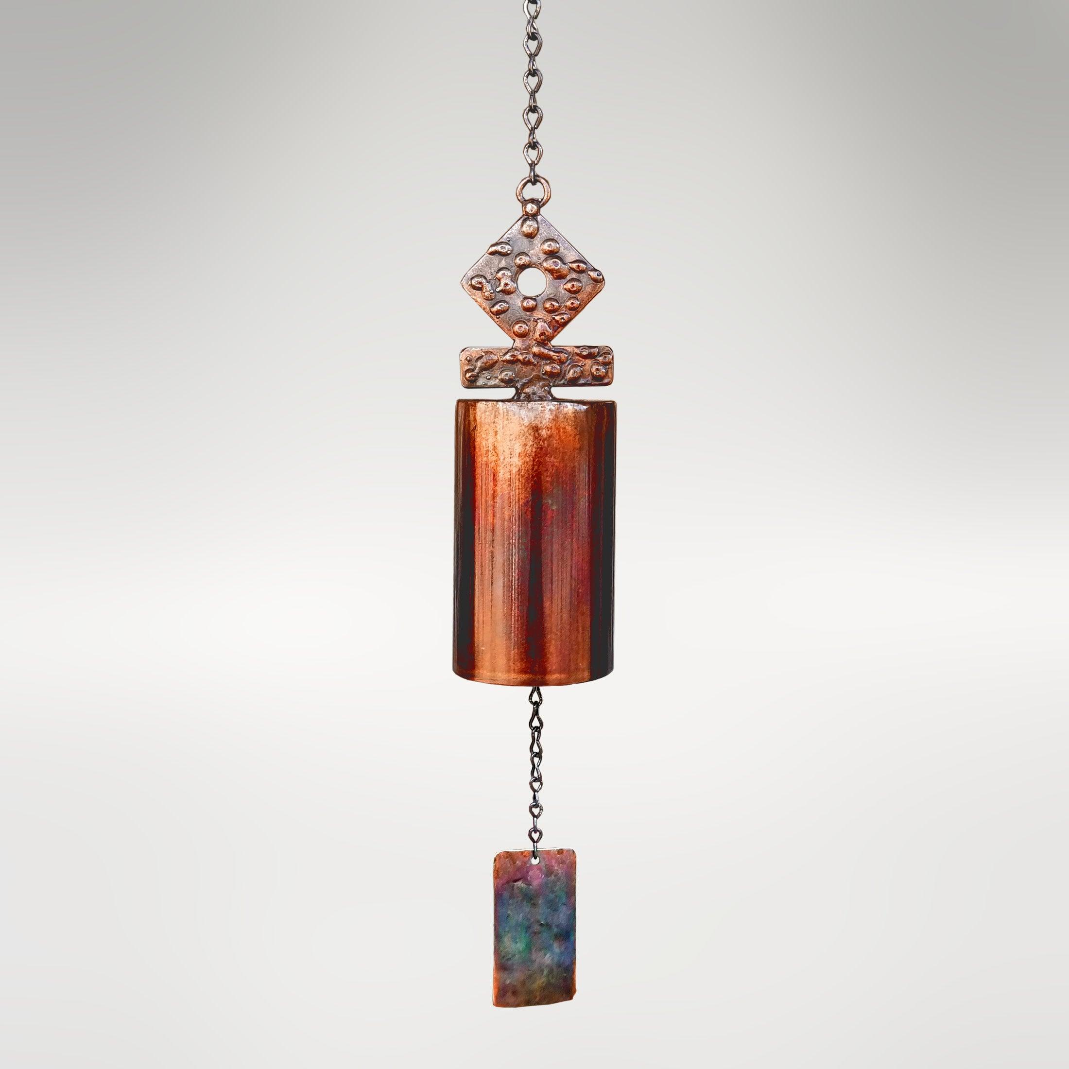 A rustic wind bell titled San Miguel. Hand made in America at the Lago Luna Lakeside Studio in Clarksville, Virginia